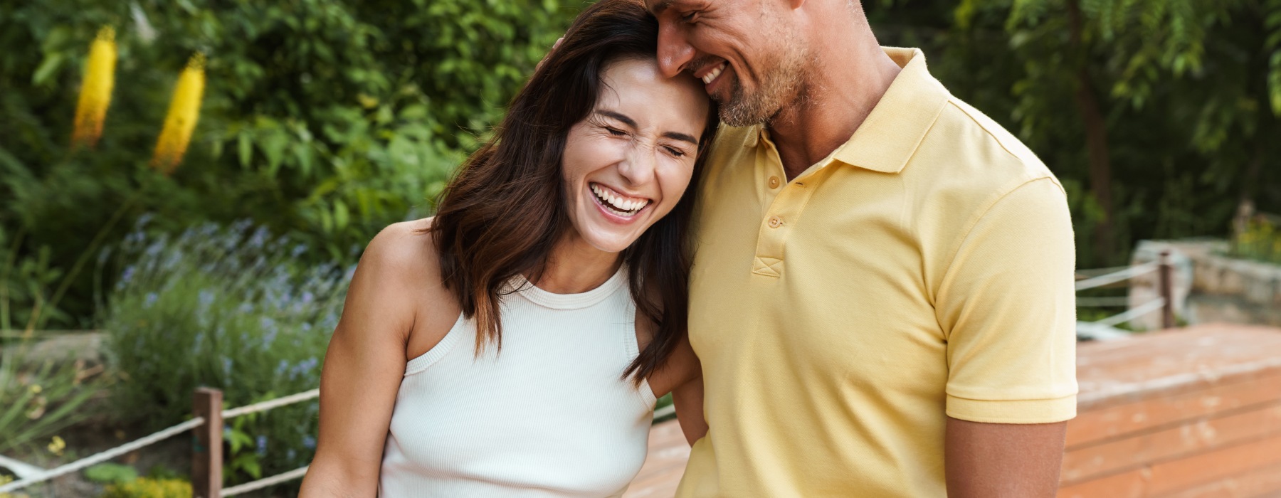 a man and woman walking in park