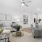 a living room with a fan and a couch