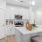 a kitchen with white cabinets