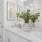 a bathroom with a large mirror