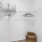 closet with shelves and woven basket on the floor